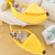 Banana-shaped pet bed
